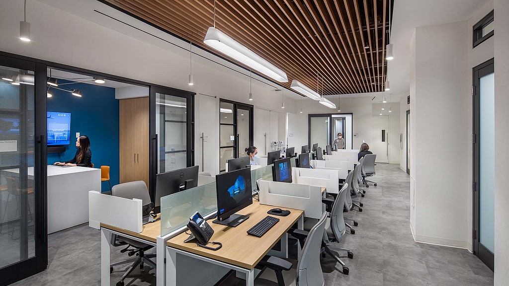 A room with a table and chairs.