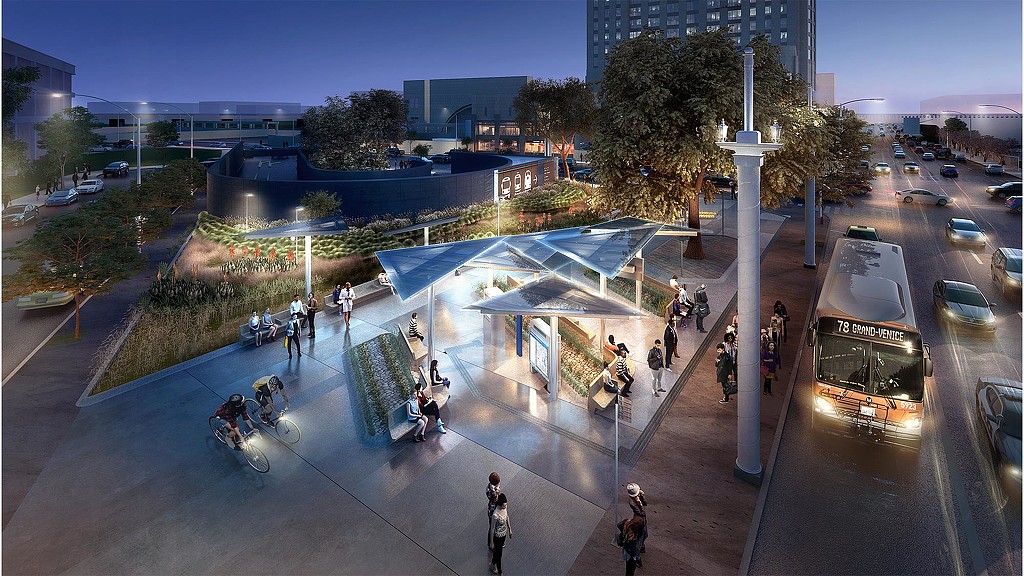 A busy street with people and cars.