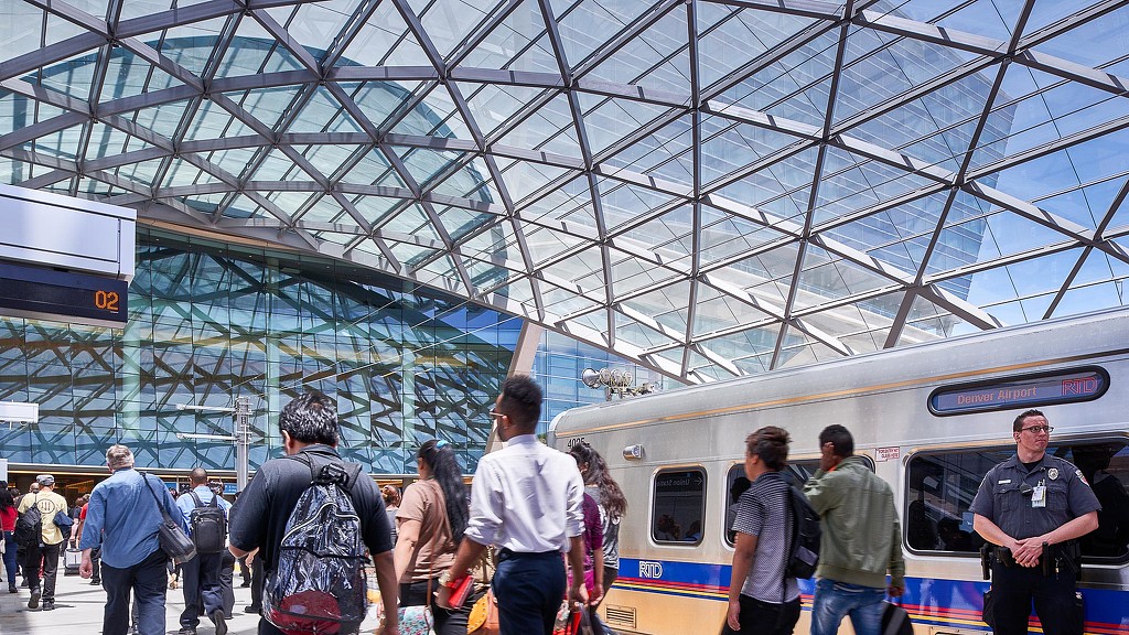 People walking near a train.
