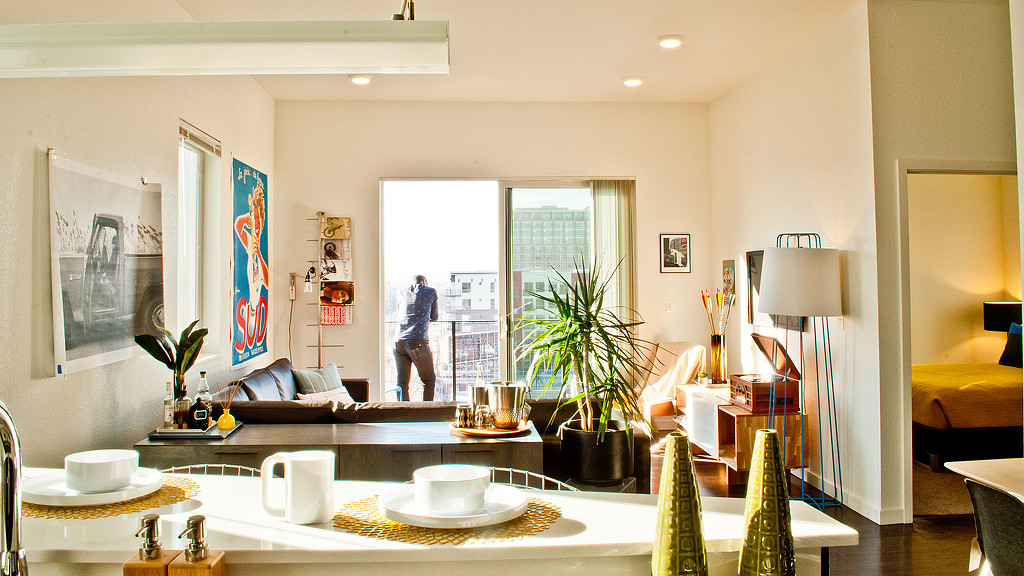 A room with a table and chairs.