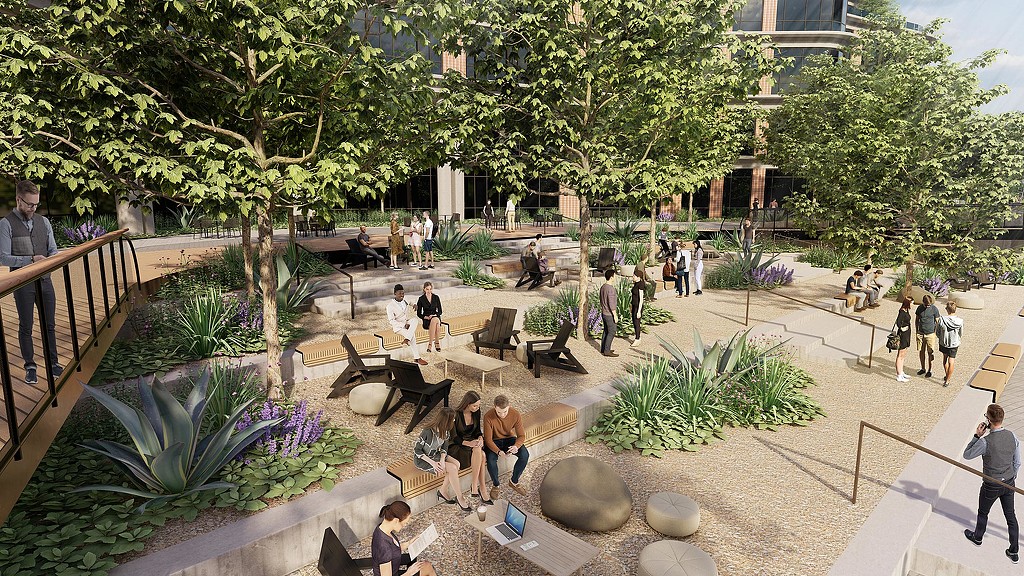 People walking around a park.