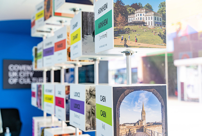 A collage of photos of a city.