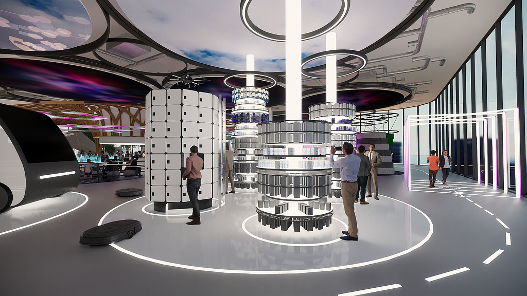 A group of people standing in a room with a large white robot.