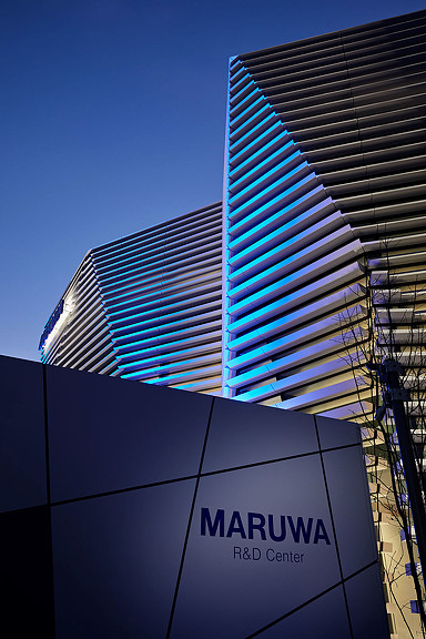 A few skyscrapers with blue sky.