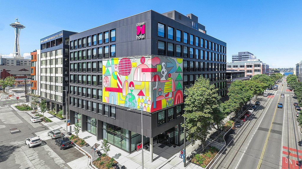 A large building with a large sign on it.