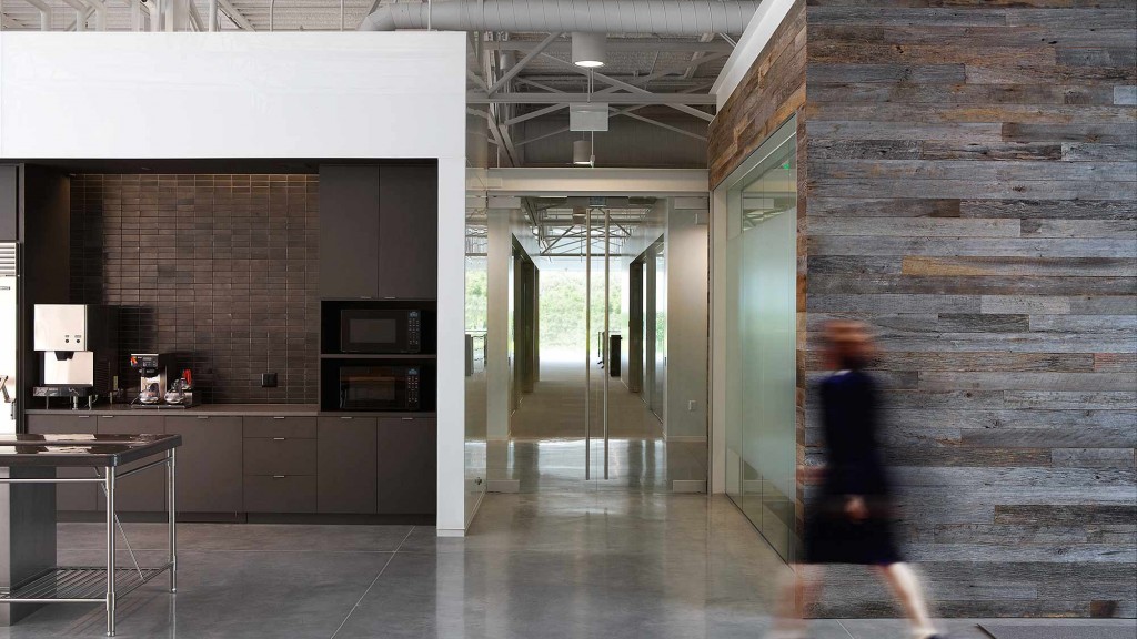 A person walking in a large room.