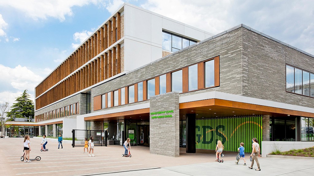 A building with people walking around.