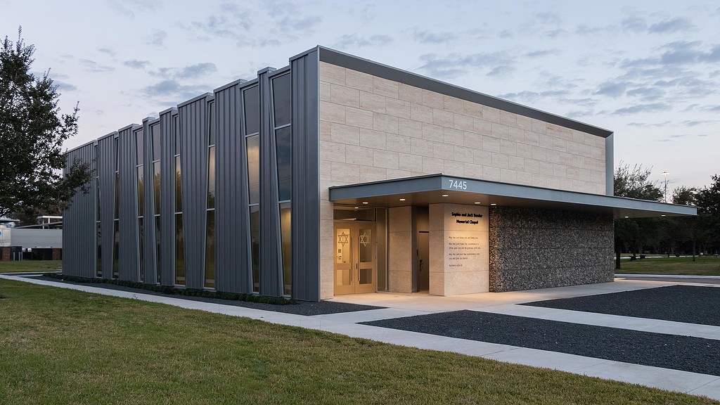 A building with a glass front.