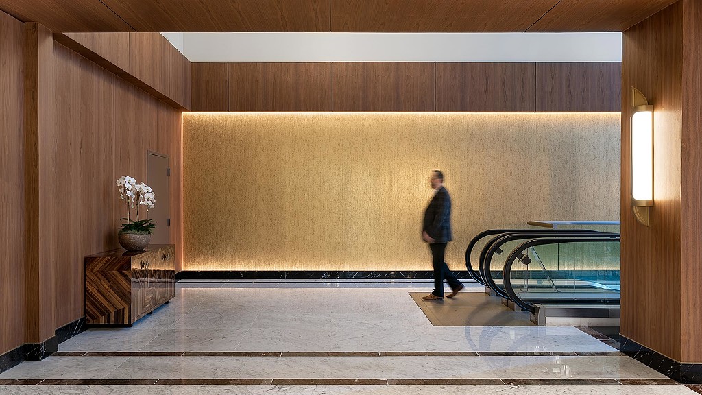 A person walking in a room.