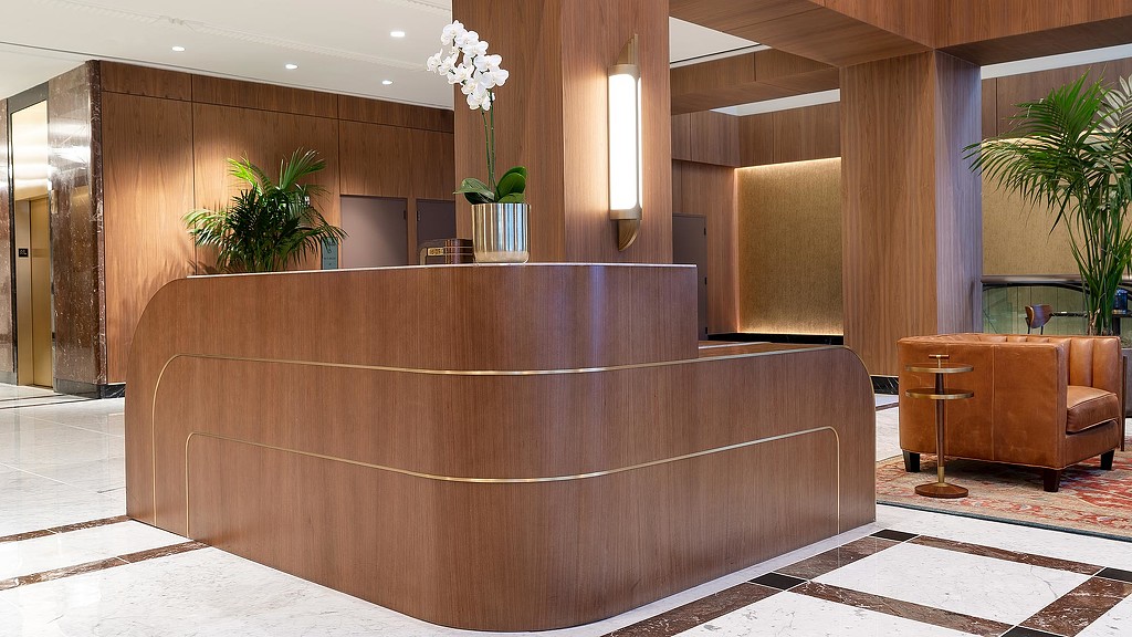 A room with a large wooden table.