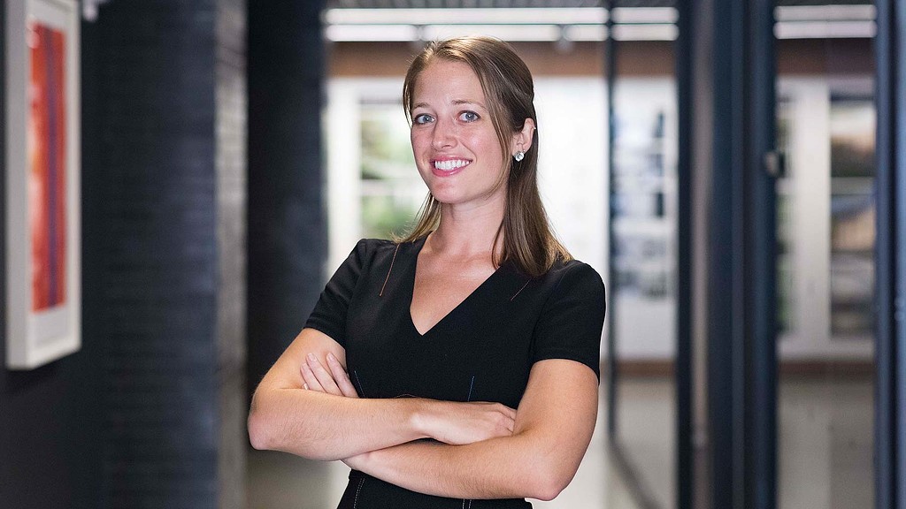 A woman with her arms crossed.