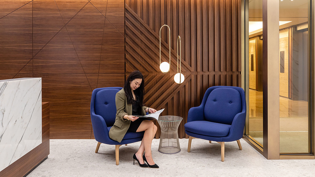 A person sitting in a chair.