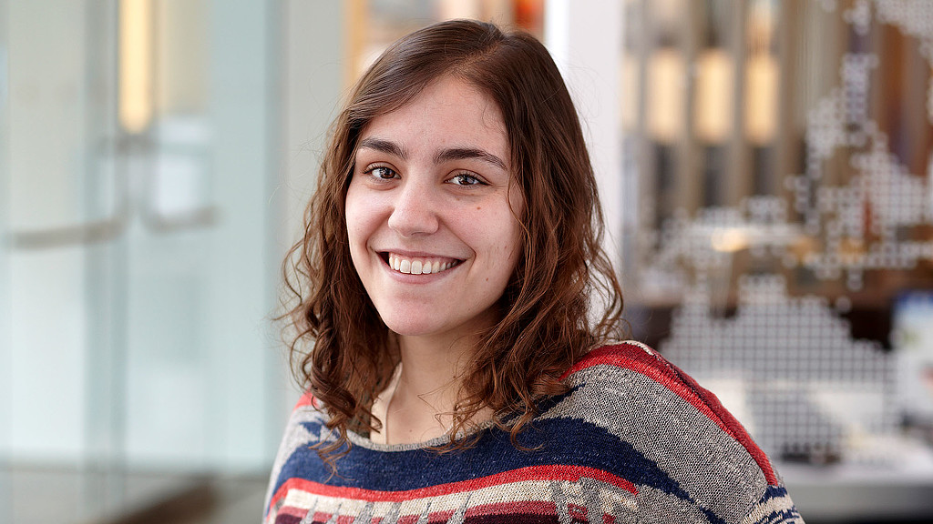 A woman smiling for the camera.