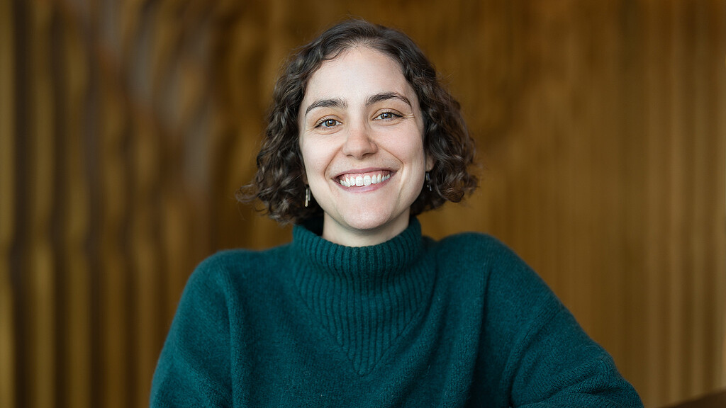A person smiling for the camera.