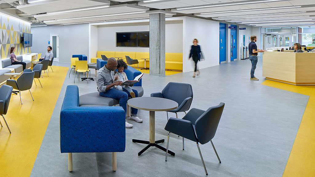 A group of people in a room.