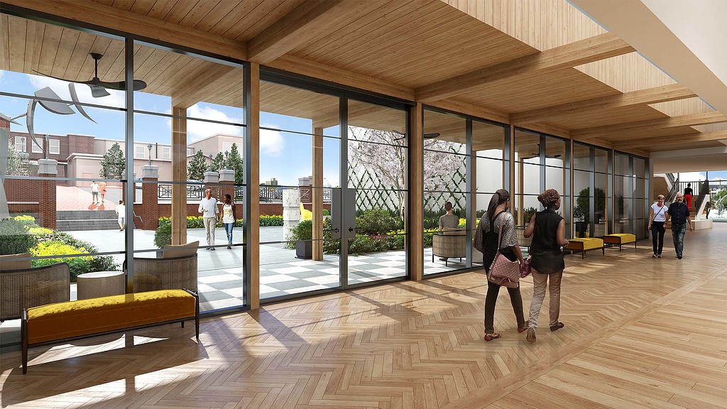 People walking in a large building.