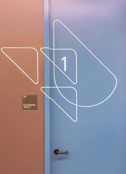 Reach Movement Studio branding detail on door