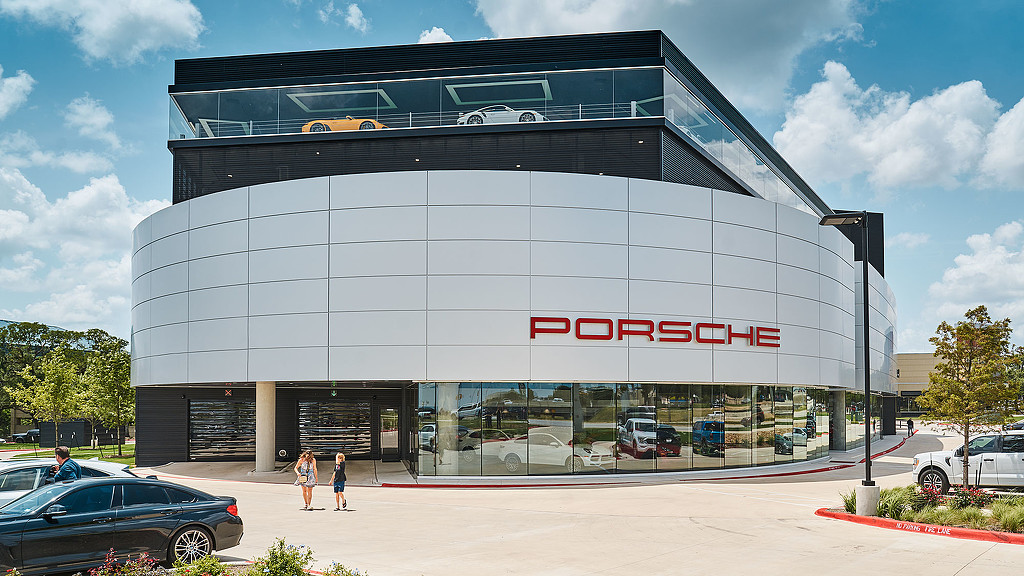 A building with a parking lot.