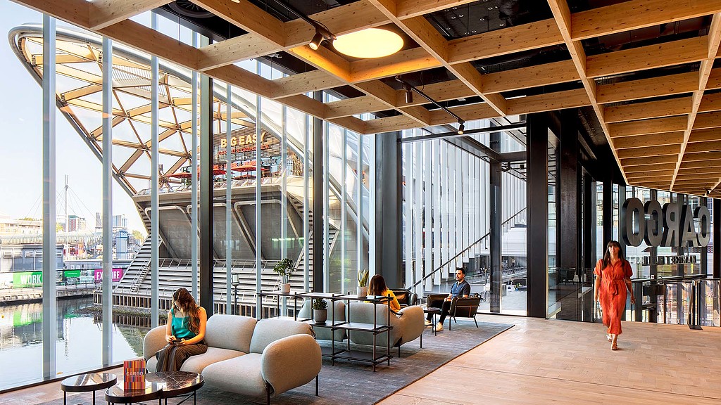 A person walking in a large room.