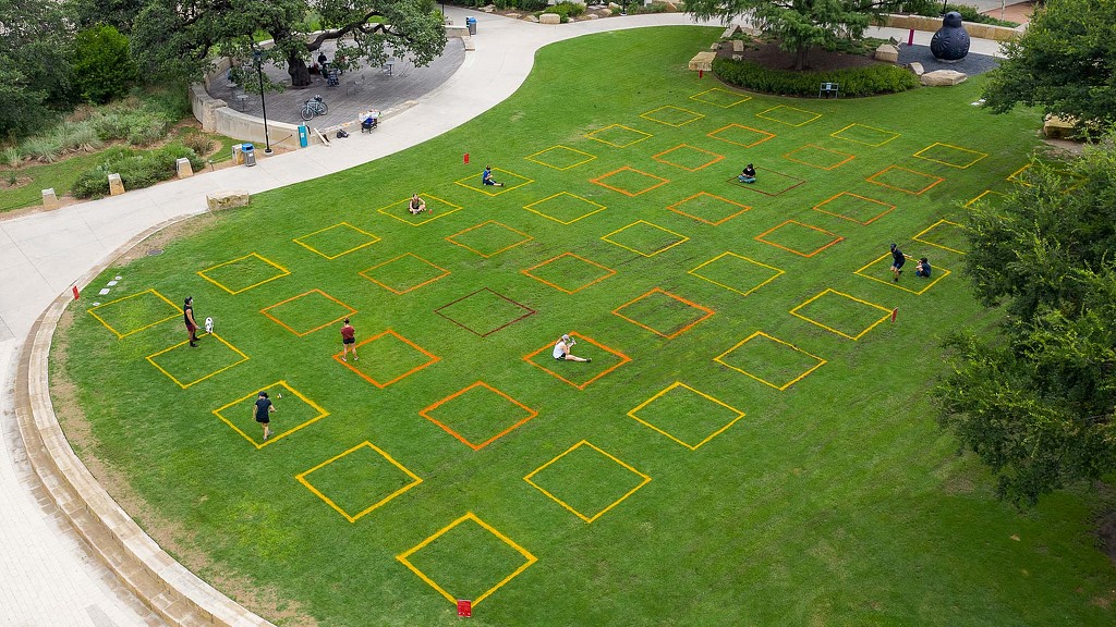 A group of people playing football.
