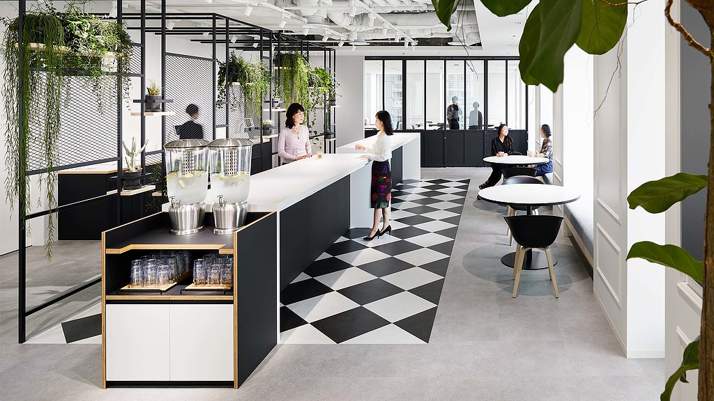 A group of people in a room.