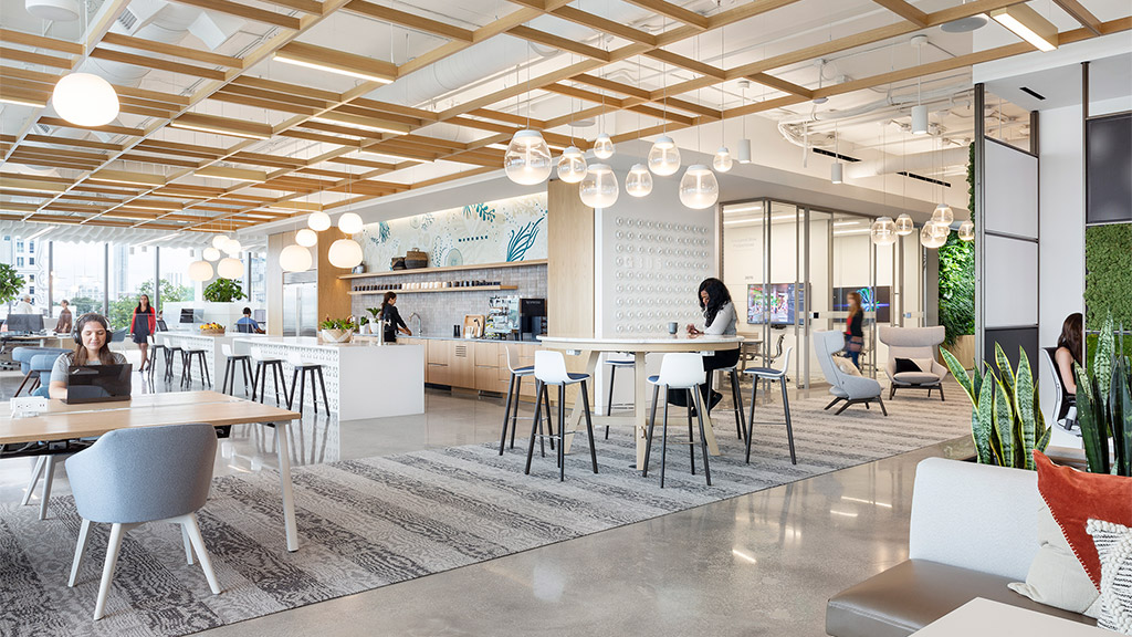 A group of people sitting at tables.