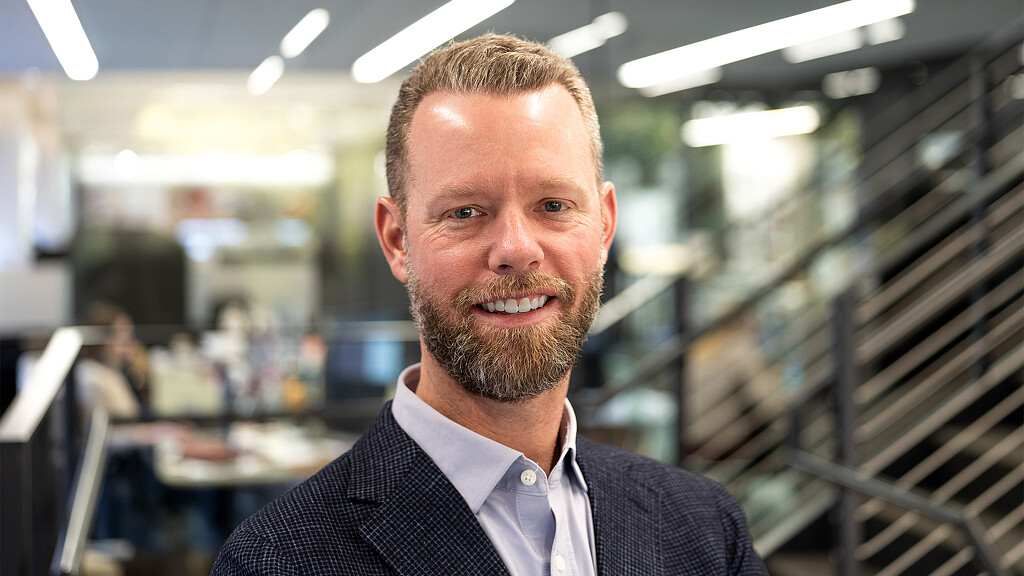 A man smiling for the camera.