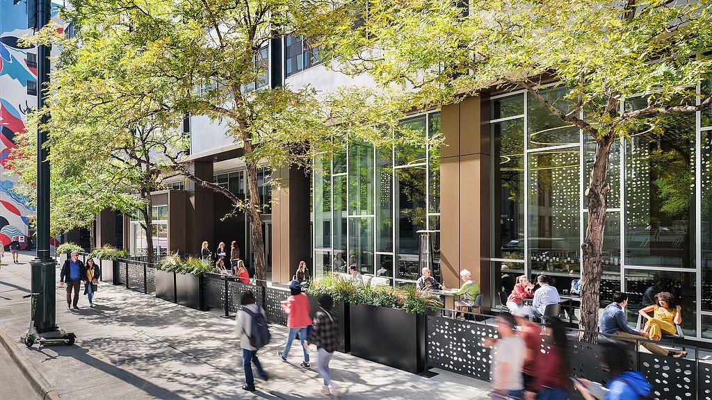 People walking on a sidewalk.