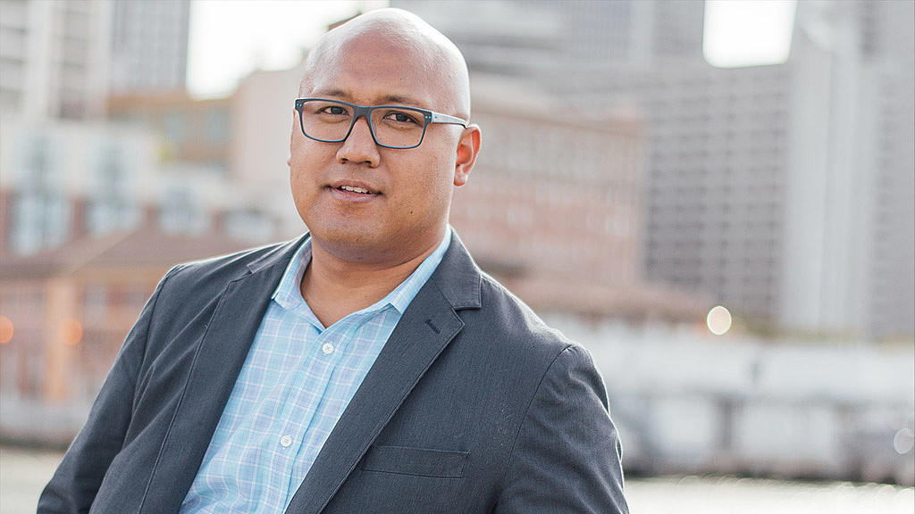 A man wearing glasses.