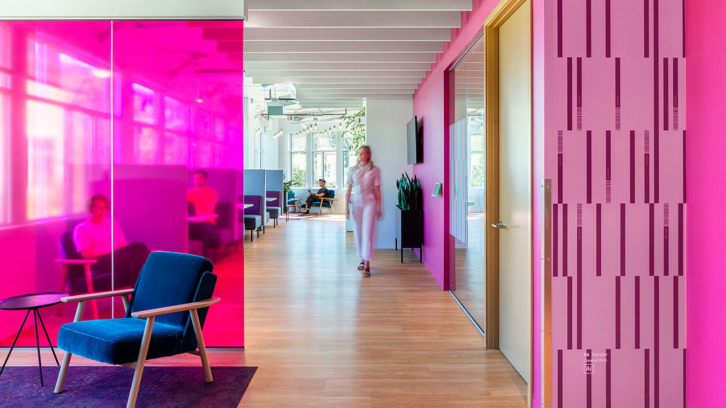 A person walking in a hallway.