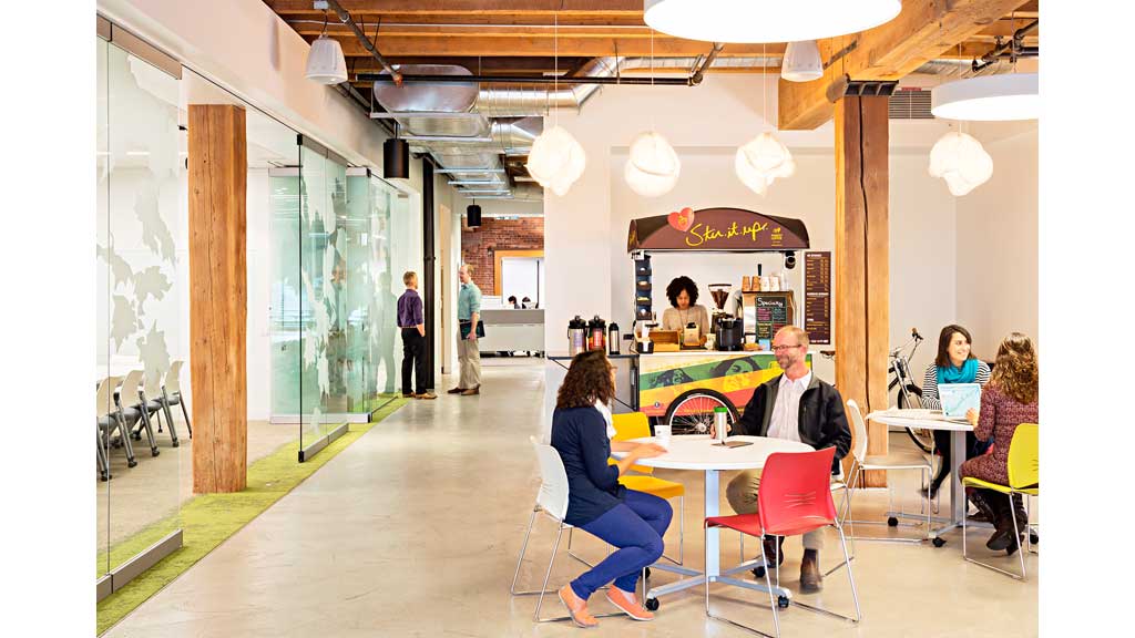 People sitting at tables in a restaurant.