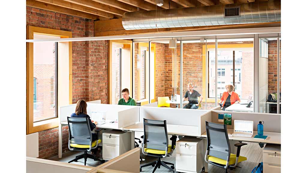 A group of people in an office.