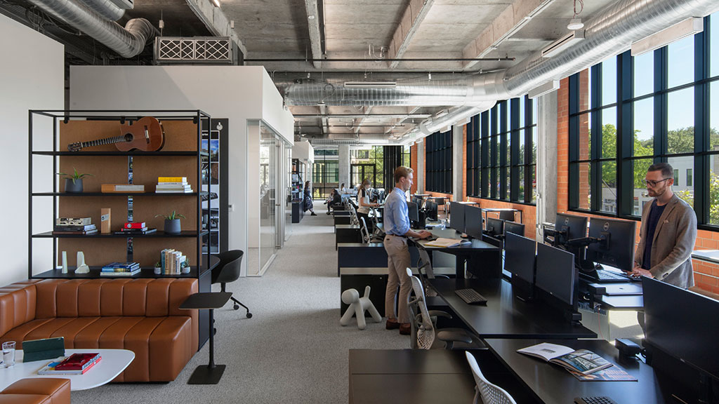 Men in an office.