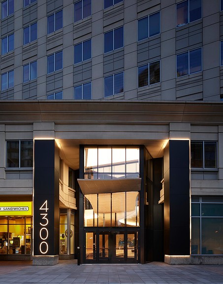 4300 Wilson building entrance exterior in the evening