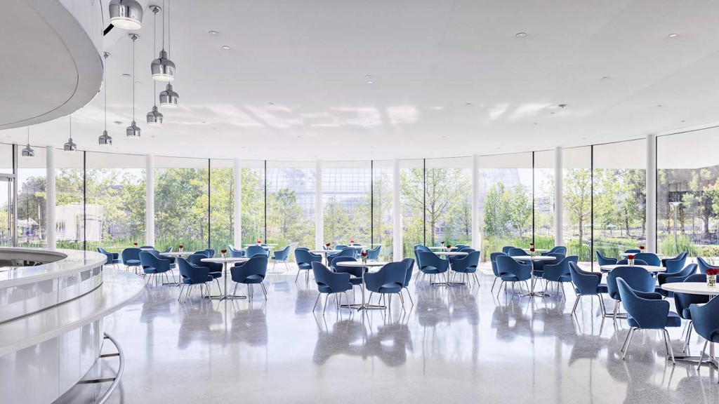 A room with tables and chairs.