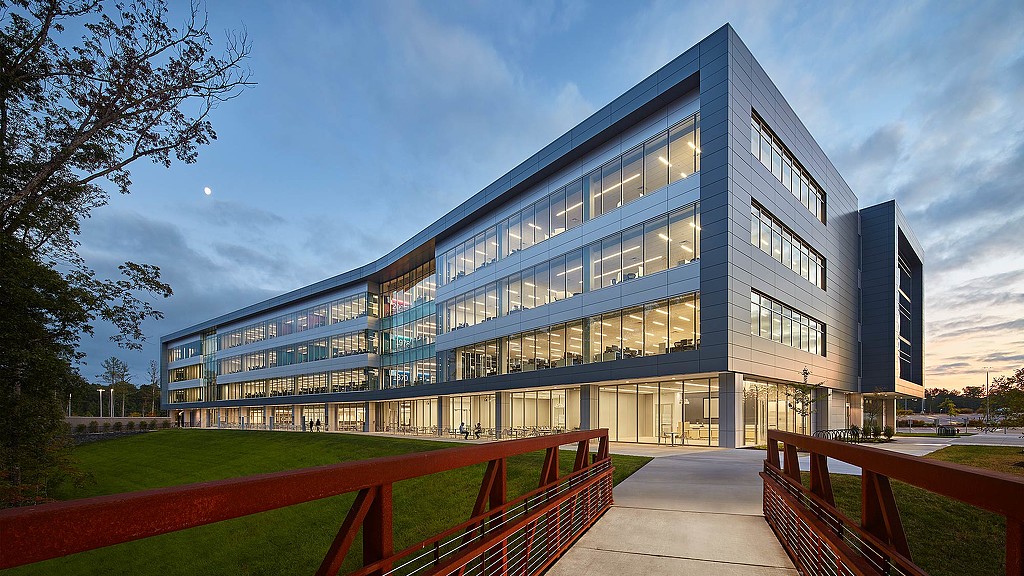 Financial services provider building exterior in the evening