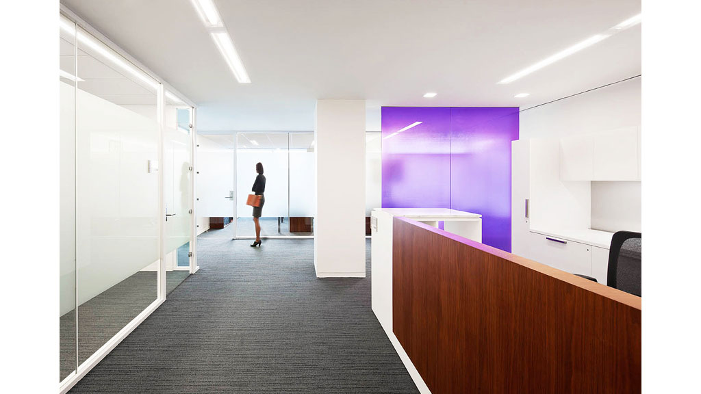 A person walking in a room.