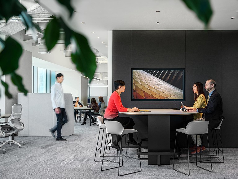 CBRE Beijing office open meeting area with screen