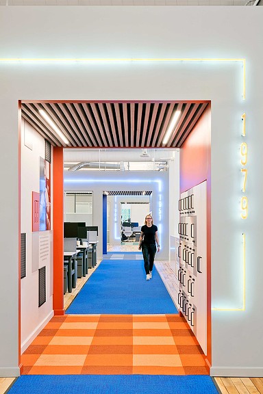 Confidential energy client headquarters orange and blue carpeted walkway