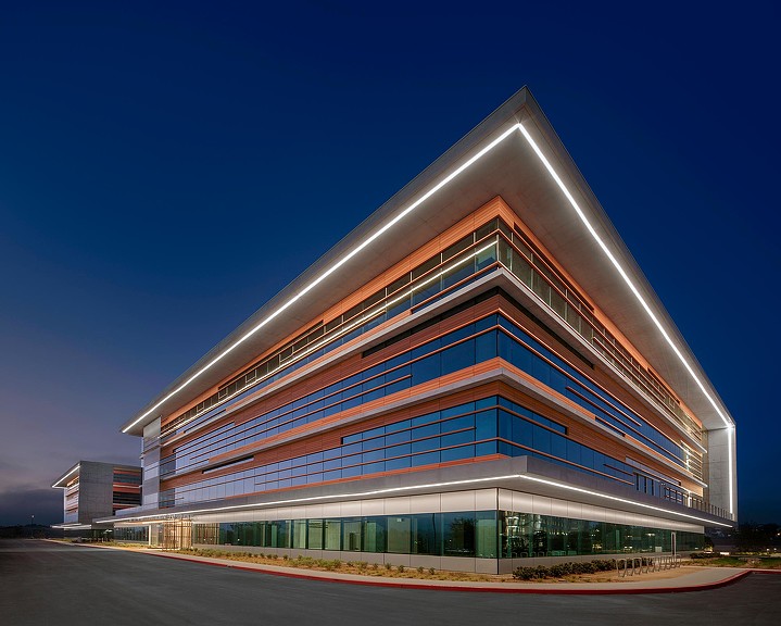 Aperture Del Mar campus building at night