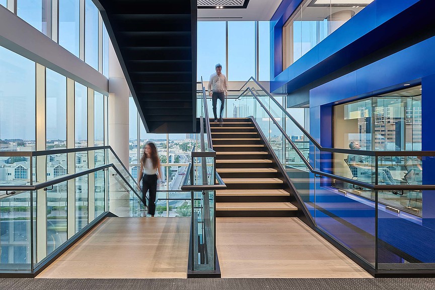 People walking up stairs.