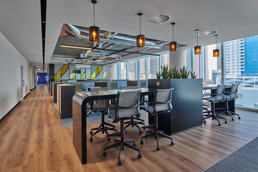 A room with tables and chairs.