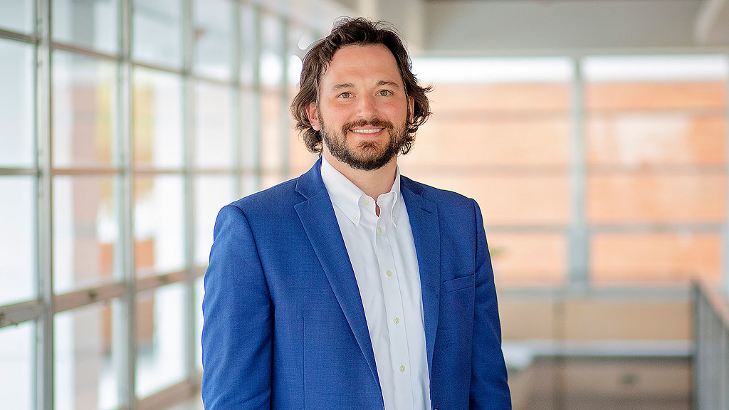 A man in a blue suit.