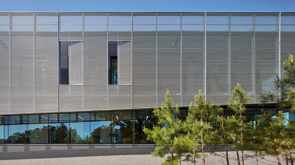 A building with trees in front of it.