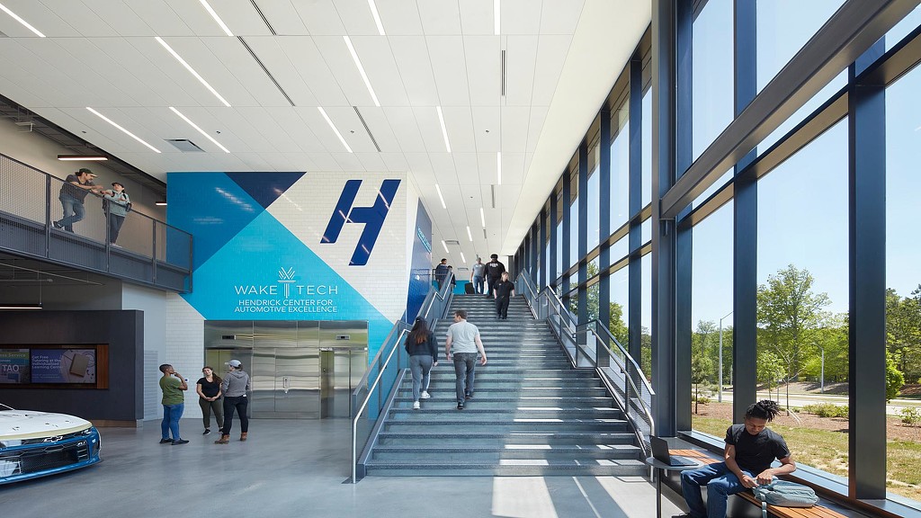 People walking on a walkway.