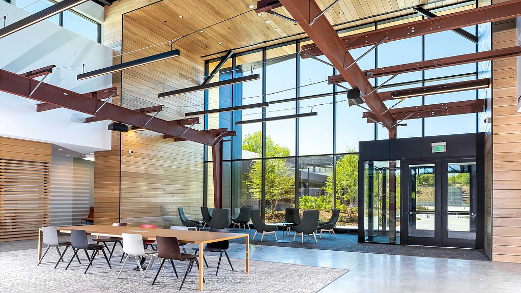 A room with a table and chairs.