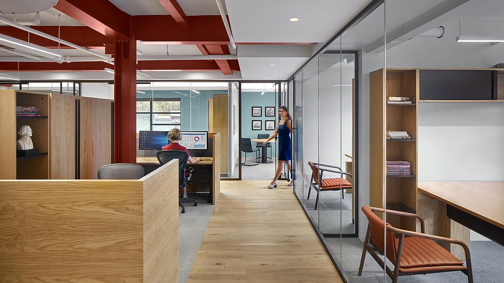 Oxford Finance hallway with workstations and meeting rooms