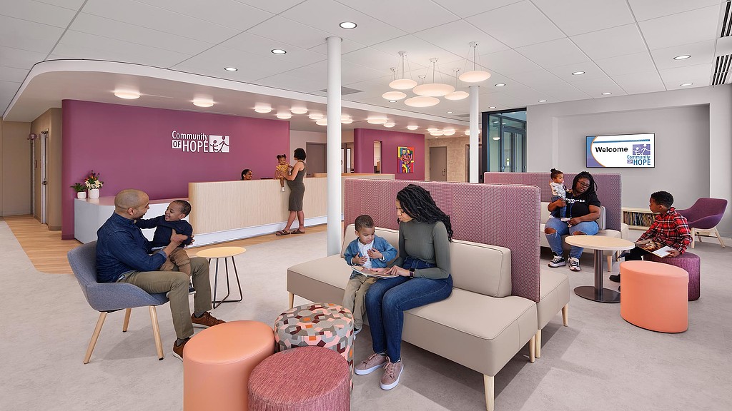 A group of people sitting in chairs.