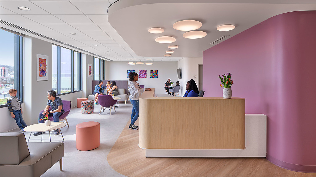 A group of people in a room.