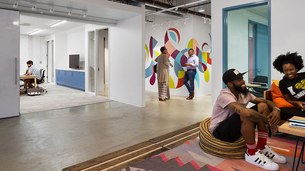 A group of people in a room.